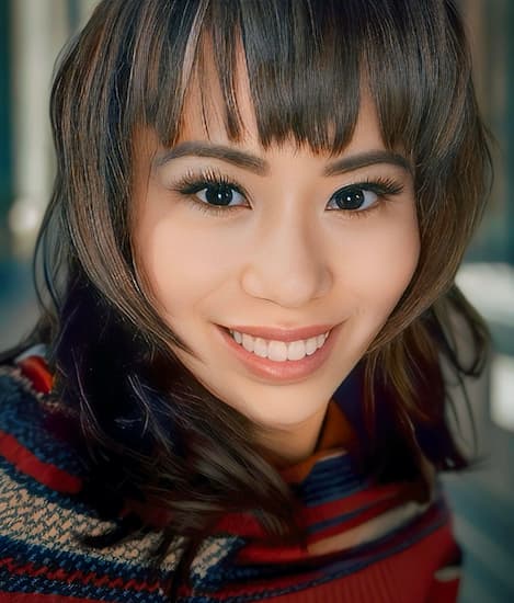 Headshot of Maria Rheba Estante, Head Clinician at Exposure Therapy Designs.